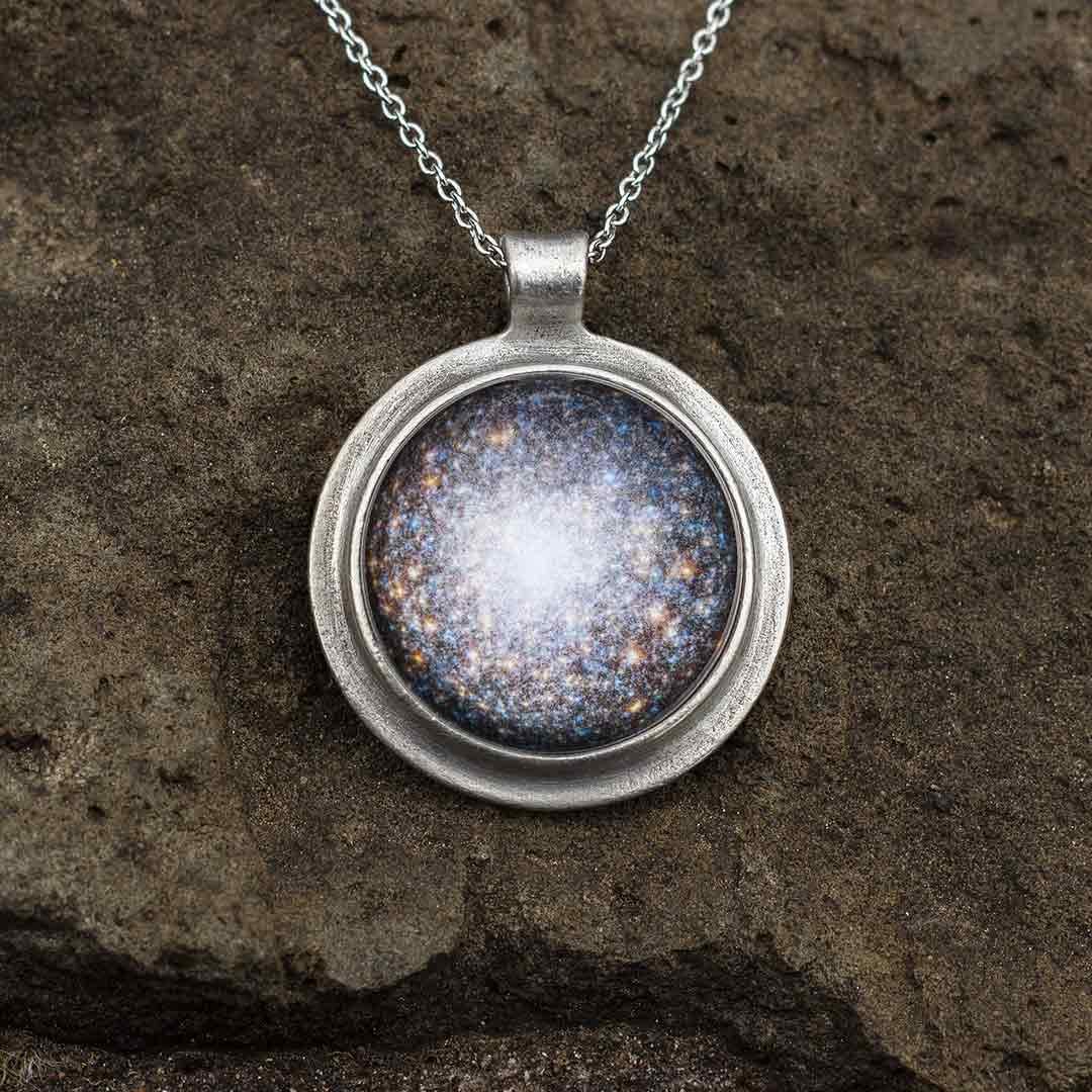 Star Cluster Necklace - space science jewelry for astronomy. Great gift for an astronomer, star gazer, science teacher, or scientist. This necklace encases the M13 star cluster under a glass dome.