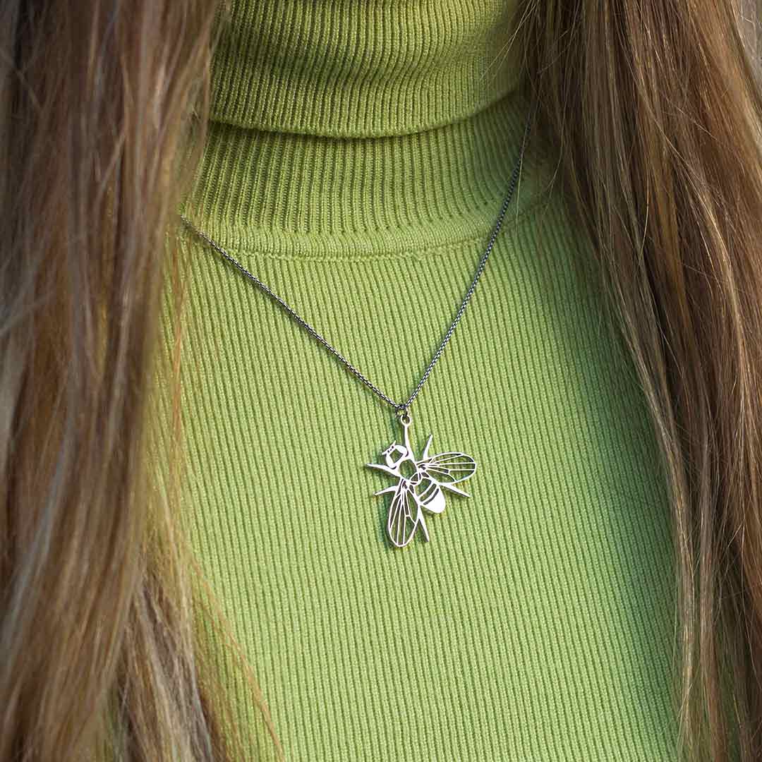 Drosophila fruit fly necklace - science jewelry gift for a student or researcher in biology or genetics. Silver steel version.