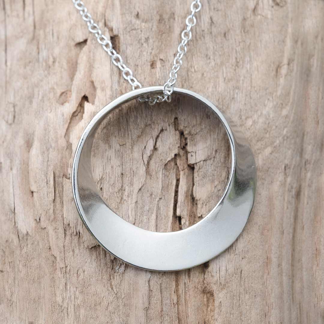 Mobius Necklace on a silver chain - math jewelry, great gift for mathematics students and teachers, artists, and basically anyone