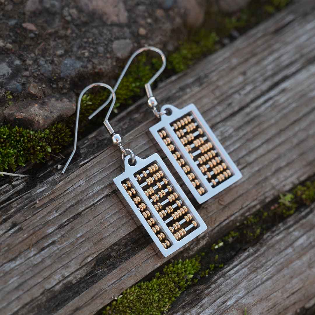 Abacus Earrings with moving gold beads. Great science jewelry gift for a mathematician, math teacher, or student! Each abacus measures 20 mm long, 12 mm wide and is made from steel with moving gold beads on surgical steel ear hooks.