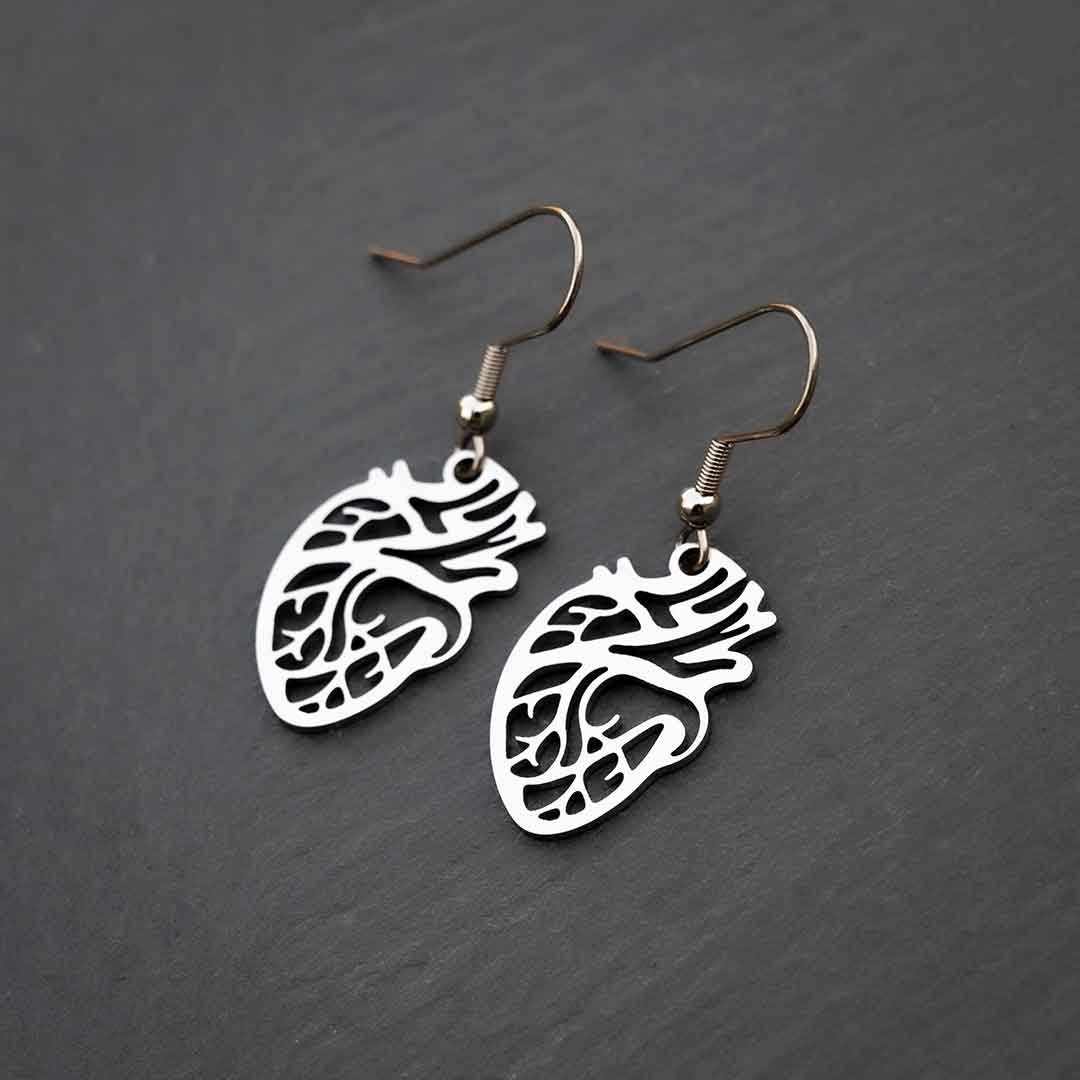Anatomical Heart Earrings in silver colored steel. Anatomically correct, they make a unique science jewelry gift!