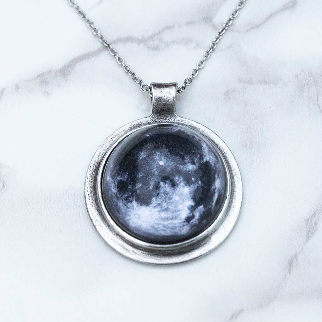 Moon Necklace - space science jewelry for astronomy. Great gift for an astronomer, star gazer, science teacher, or lunar observer. The pendant is an image of the moon, encased in a glass dome.