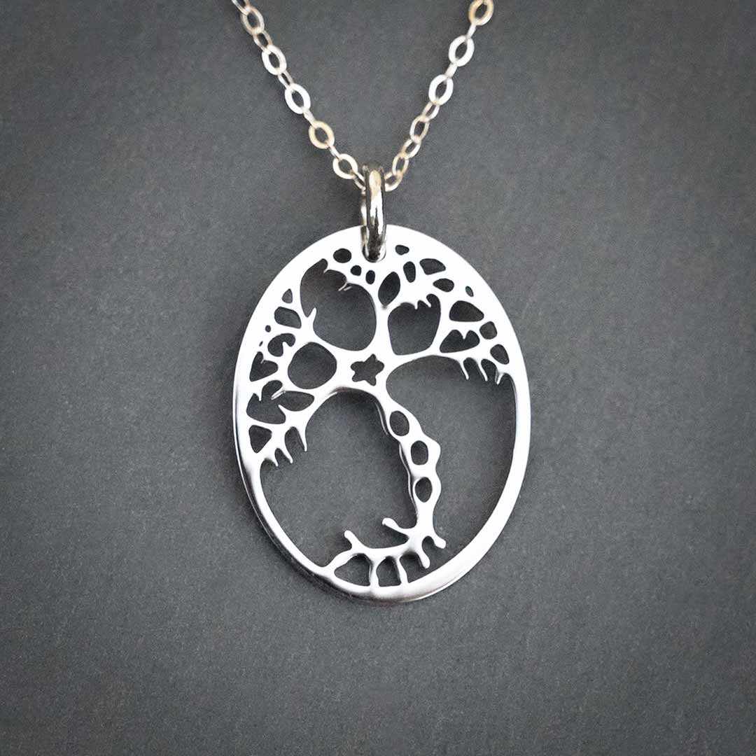 Neuron necklace: science jewelry for biology and neuroscience. Great gift for teachers, biologists, nurses, and neuroscientists. Silver steel pyramidal neuron on a sterling silver chain.