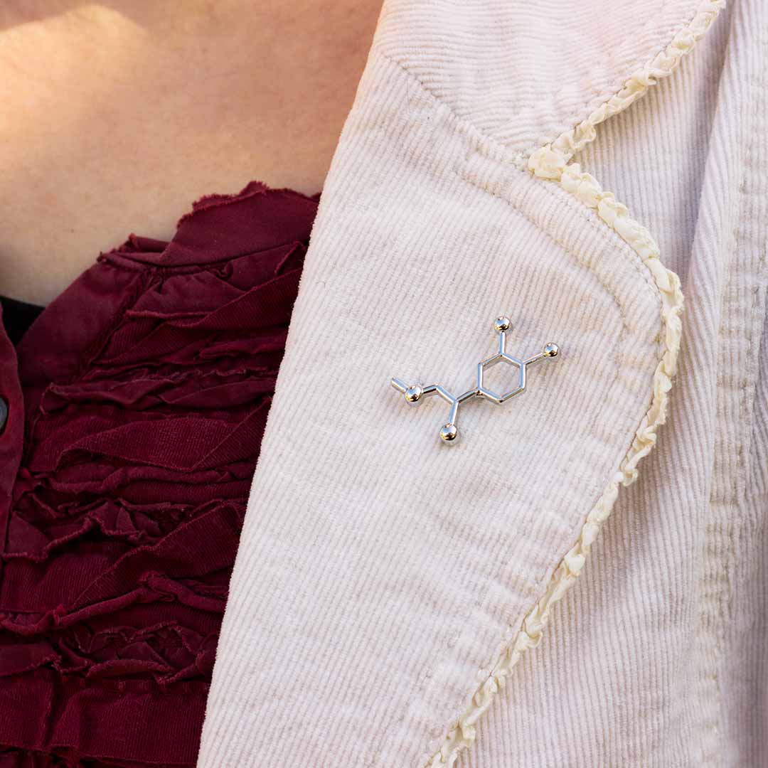 Adrenaline Pin - Great science jewelry gift for adventurers, sky divers, rock climbers, neurologists, ER doctors, heart specialists, EpiPen carriers, cardiac arrest survivors, and anyone who appreciates the role this neurotransmitter plays in their life. Pin measures 1.7cm long and 3cm wide. It comes with a metal pin clasp and is made from a zinc alloy.