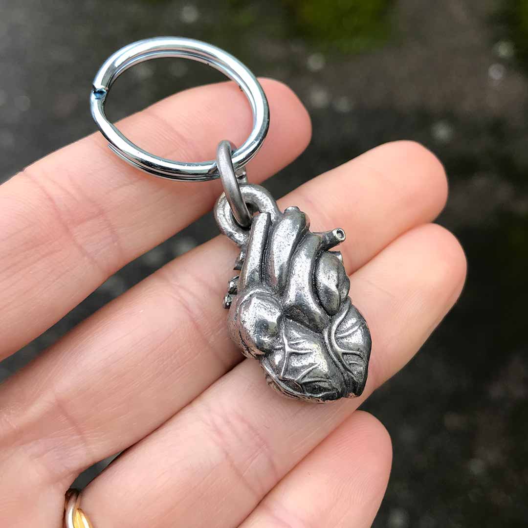 Anatomical Heart Keychain - Perfect science jewelry gift for nurses, doctors, med students, cardiologists, medical researchers, science teachers, friends, lovers, and anyone with a heart. Anatomically correct from superior vena cava to apex, this pewter heart is small-batch cast from a hand-carved model and comes on a heavy duty keyring.