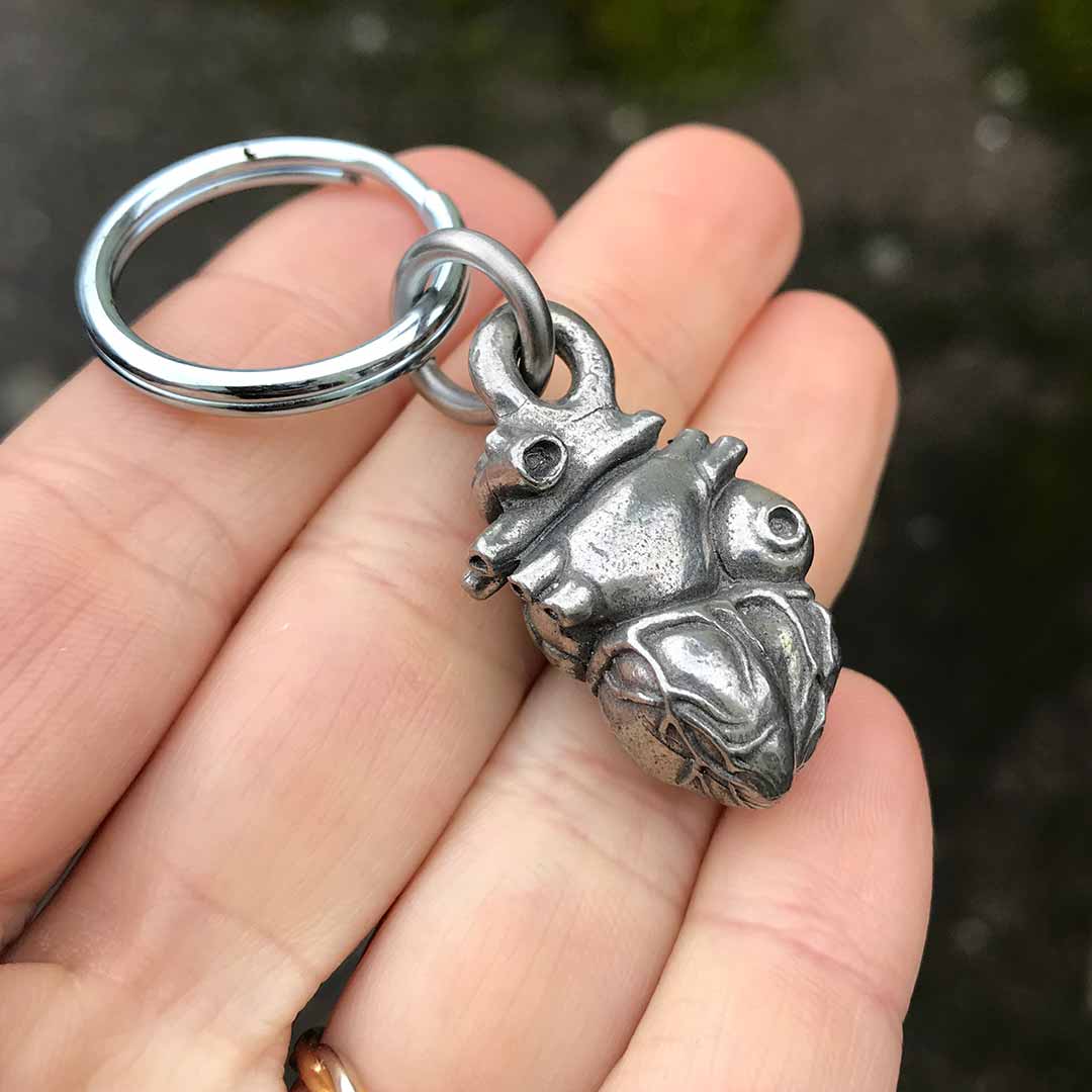 Anatomical Heart Keychain - Perfect science jewelry gift for nurses, doctors, med students, cardiologists, medical researchers, science teachers, friends, lovers, and anyone with a heart. Anatomically correct from superior vena cava to apex, this pewter heart is small-batch cast from a hand-carved model and comes on a heavy duty keyring.