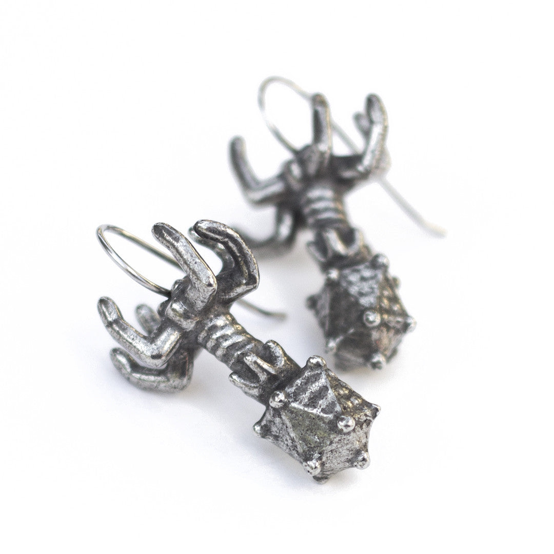 Pewter bacteriophage (phage) earrings resting on a white background. Great science jewelry gift for biologists, science teachers, biology majors, and researchers.