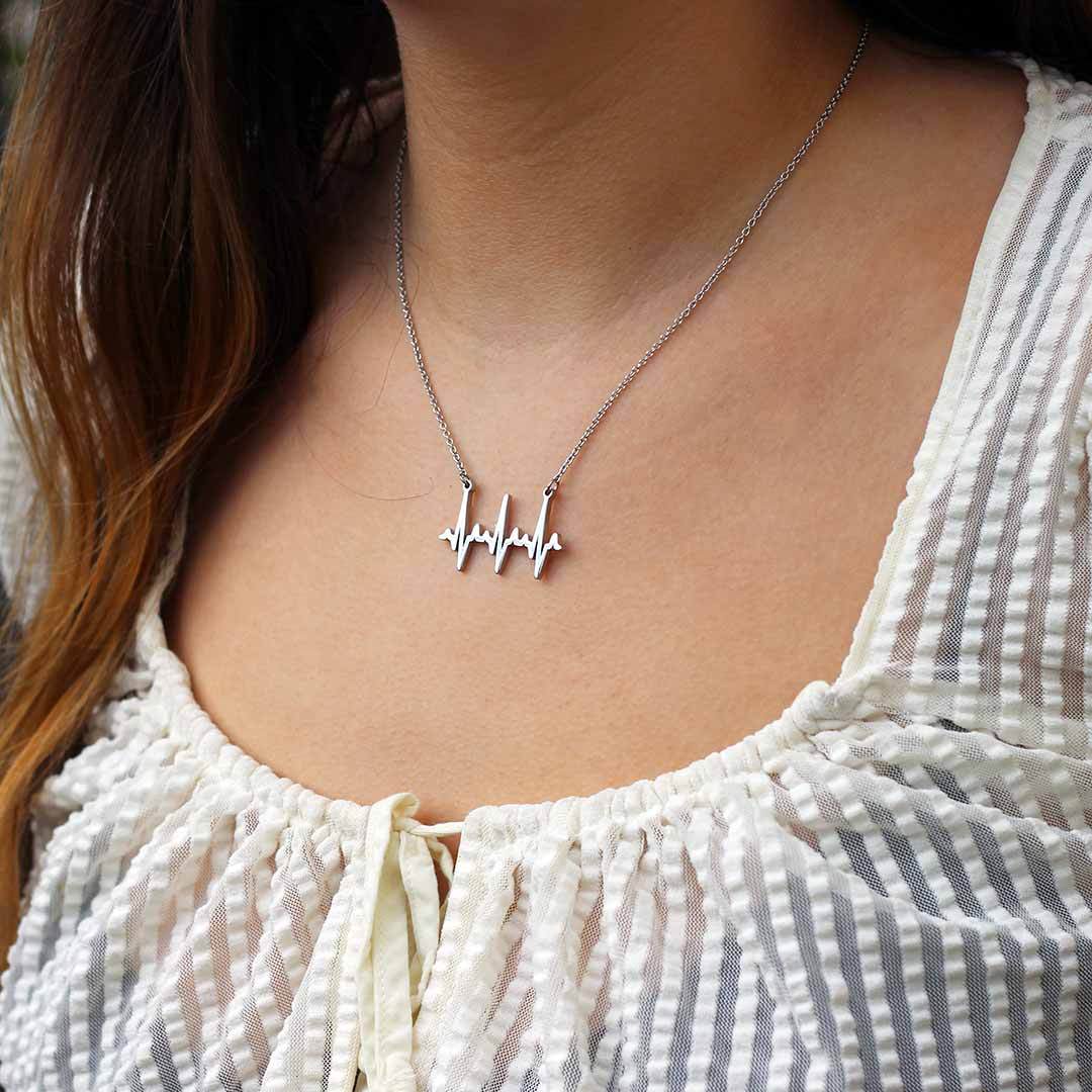 Heartbeat Necklace - based on real cardiograms, this scientifically accurate necklace makes a beautiful science jewelry gift for a nurse, doctor, medical student, or anyone who loves life. (Silver version)