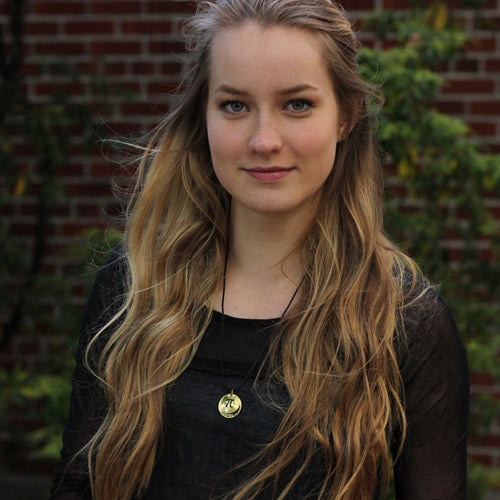 Pi math necklace showing the pi symbol on one disc and pi to 35 decimal places on the second disc. Great gift for a mathematician, a student or a teacher of mathematics. 