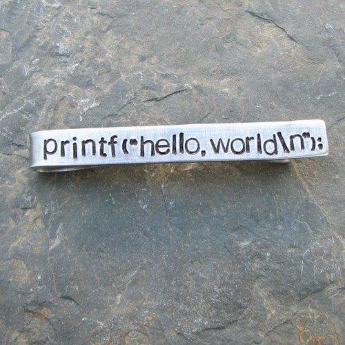Printf("hello,world\n"); tie bar - perfect science jewelry gift for computer scientists, programmers, and technology teachers and students. Tie bar is made from sturdy hand stamped aluminum.