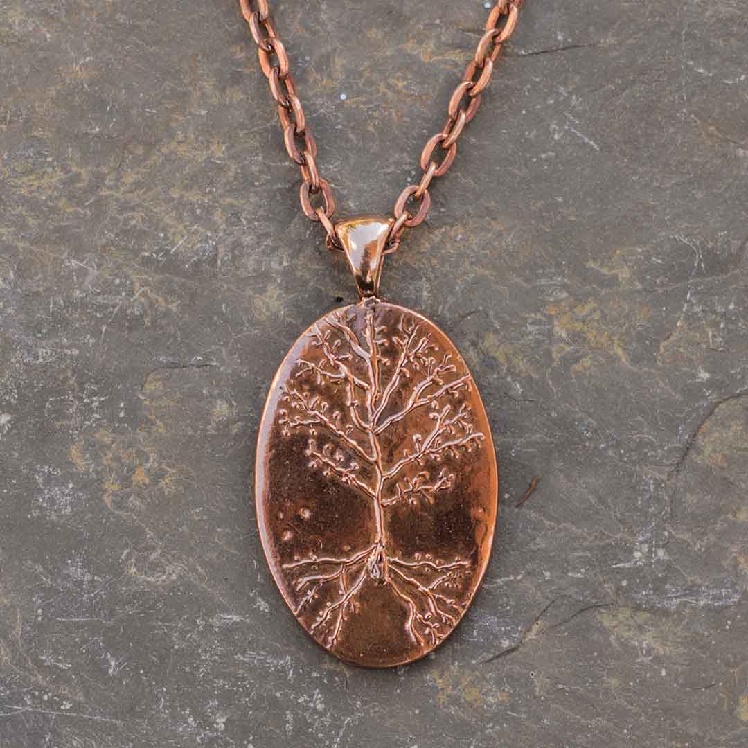 Neuron necklace: science jewelry for biology and neuroscience. Great gift for teachers, biologists, nurses, and neuroscientists. Hand worked and kiln-fired copper pyramidal neurons on an 18 inch copper chain.