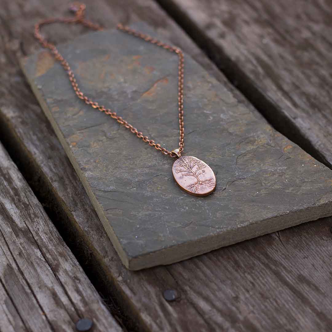 Neuron necklace: science jewelry for biology and neuroscience. Great gift for teachers, biologists, nurses, and neuroscientists. Hand worked and kiln-fired copper pyramidal neurons on an 18 inch copper chain.
