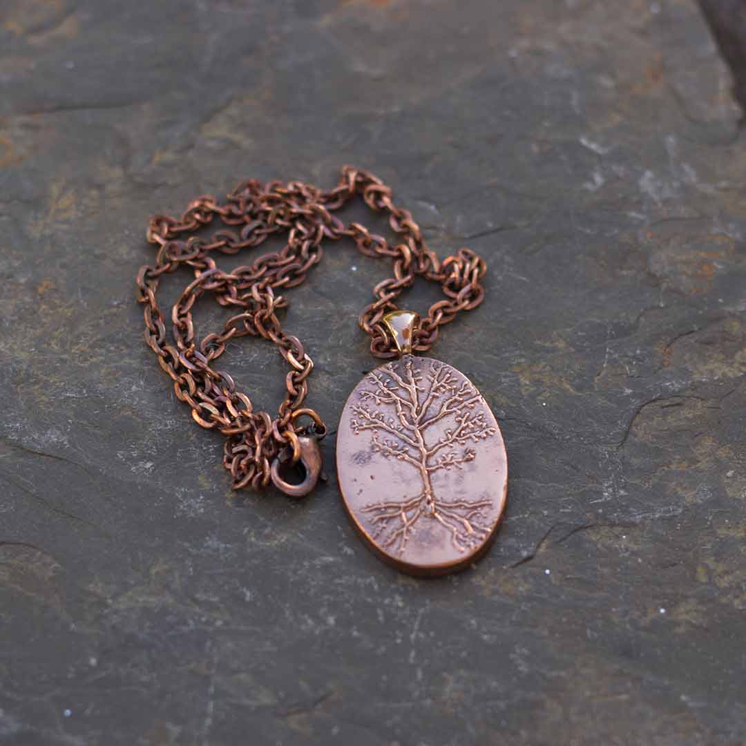 Neuron necklace: science jewelry for biology and neuroscience. Great gift for teachers, biologists, nurses, and neuroscientists. Hand worked and kiln-fired copper pyramidal neurons on an 18 inch copper chain.