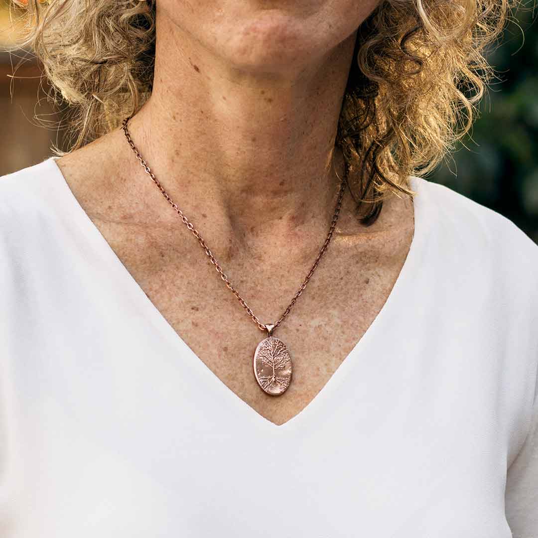 Neuron necklace: science jewelry for biology and neuroscience. Great gift for teachers, biologists, nurses, and neuroscientists. Hand worked and kiln-fired copper pyramidal neurons on an 18 inch copper chain.