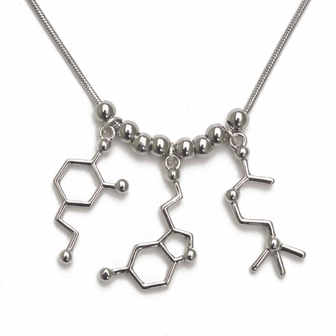 Neurotransmitter molecule necklace that includes dopamine, serotonin, and acetylcholine. Beautiful science jewelry and great gift for a teacher, scientist, or biology student.