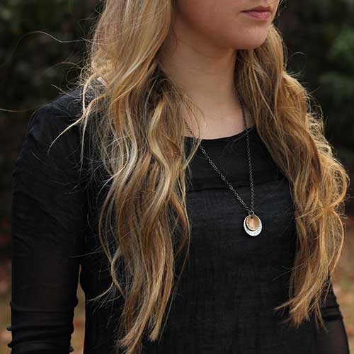 Qui Audet Adipiscitur - &quot;She Who Dares, Wins&quot; Necklace - Perfect science jewelry for innovators, experimenters, entrepreneurs,  and anyone with a dream. Makes a beautiful gift for graduations, birthdays, or starting a new challenging venture. Hand-stamped weathered bronze and aluminum discs, hung from a 28 inch gunmetal chain.