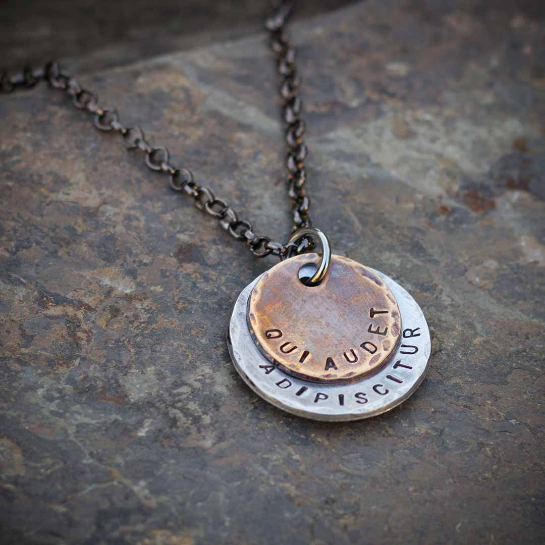 Qui Audet Adipiscitur - &quot;She Who Dares, Wins&quot; Necklace - Perfect science jewelry for innovators, experimenters, entrepreneurs,  and anyone with a dream. Makes a beautiful gift for graduations, birthdays, or starting a new challenging venture. Hand-stamped weathered bronze and aluminum discs, hung from a 28 inch gunmetal chain.