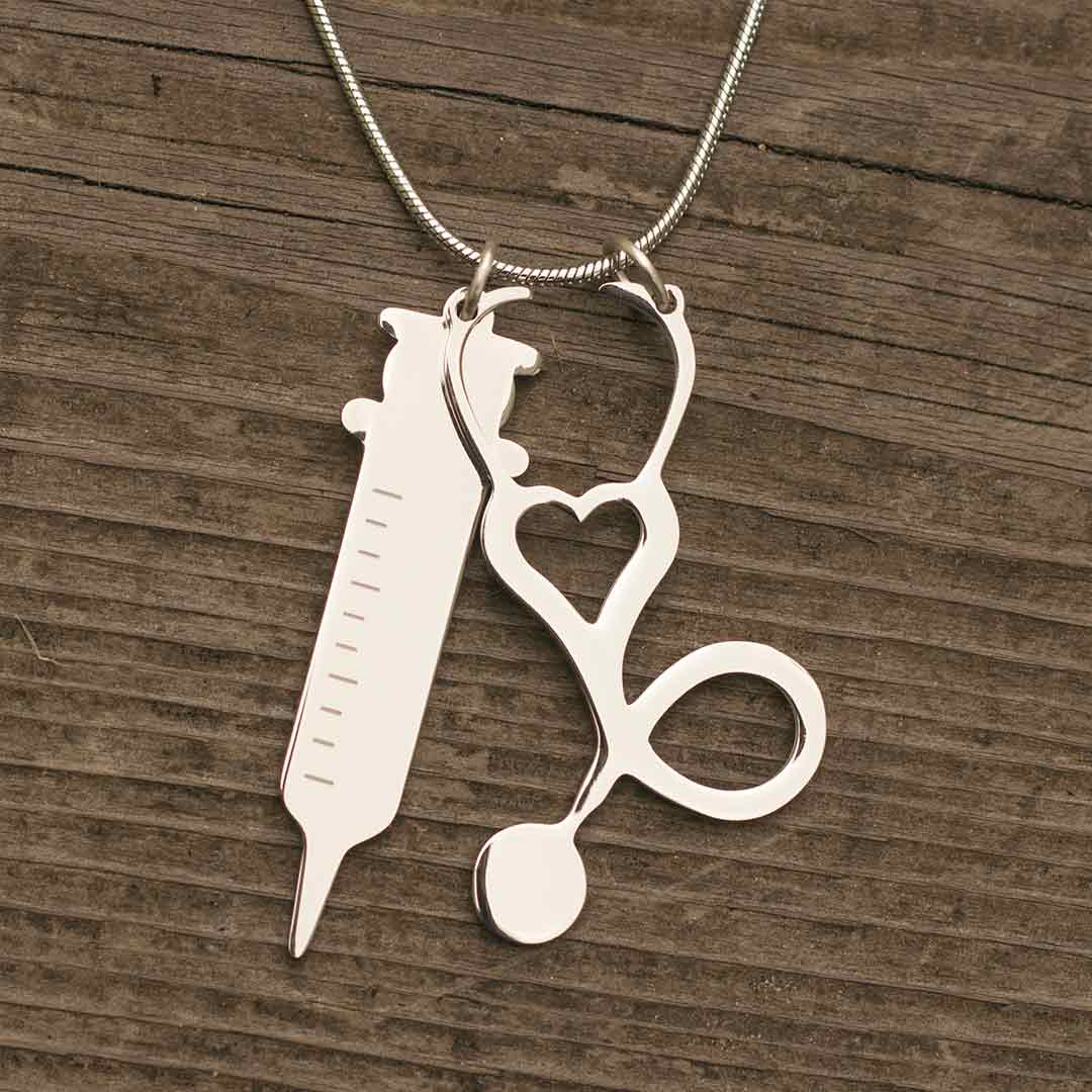 Stethoscope and Syringe Necklace - great jewelry gift for a nurse, pediatrician, doctor, or med student.